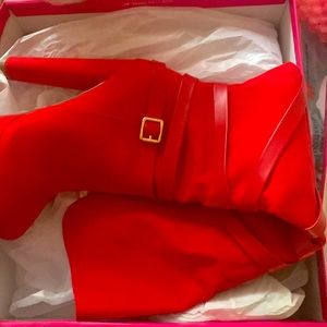 these are red thigh high boots .